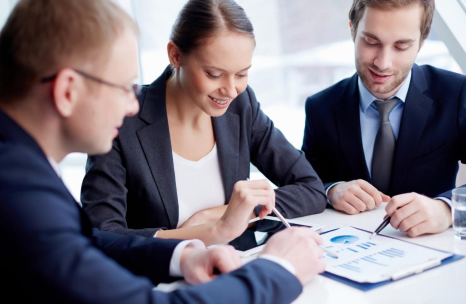 Business meeting discussing financial analysis and strategic planning